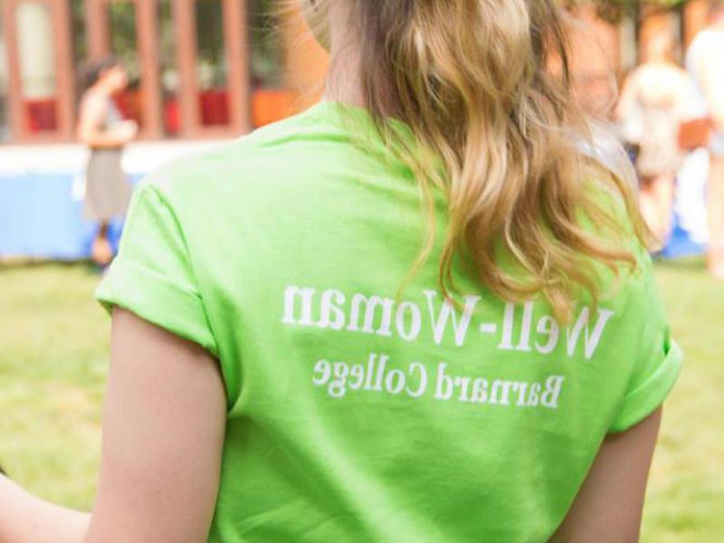 Back of a woman's T-shirt says Well Woman at Barnard College